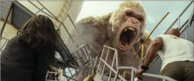  ?? PHOTO COURTESY OF WARNER BROS. VIA AP ?? This image released by Warner Bros. shows a scene from “Rampage.”