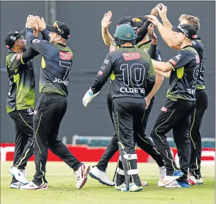  ?? Picture: GALLO IMAGES) Note: Notes ?? SUMMER SPECTACLE: Warriors players celebrate a wicket during the T20 Challenge match between the Warriors and the Cape Cobras at Buffalo Park last month. The stadium will be hosting five high-profile provincial and franchise matches during this month