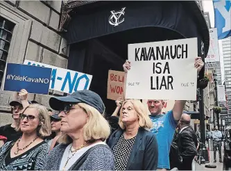  ?? SPENCER PLATT GETTY IMAGES ?? Yale alumni gather in front of the Yale Club on Tuesday to voice their opposition to the confirmati­on of Republican Supreme court nominee Judge Brett Kavanaugh, who also received degrees from the university.