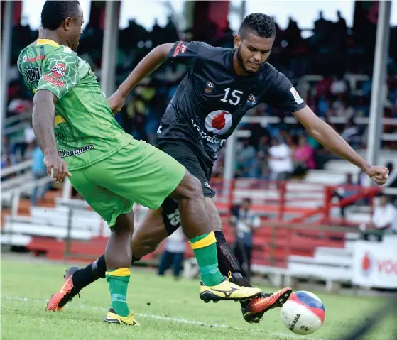  ?? Photo: Jone Luvenitoga ?? Young Ba striker, Saula Waqa (right) in full cry against Nadi during the Vodafone Fiji FACT tournament on May 19, 2017 at Ratu Cakobau Park, Nausori.