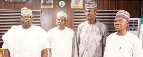  ?? ?? Nasarawa State Governor, Engr. Abdullahi A. Sule (2nd right); Director, Media Trust Limited, owners of Daily Trust and Trust TV, Malam Mannir DanAli (2nd left); General Manager/CEO, Trust TV, Malam Ibrahim Shehu Adamu (1st left); and Executive Director, Business & Strategy, Media Trust, Ahmed I. Shekarau, during a visit by management of the company to the governor, yesterday in Abuja