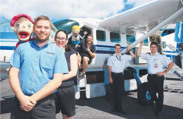  ?? Picture: JUSTIN BRIERTY ?? SUPPORT: Puppeteers Sarah McLeod and James Trigg, and Hinterland Aviation commercial director Andrew Clair and pilots Jason Page and Justin Price.