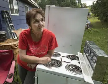  ?? FRED THORNHILL FOR THE TORONTO STAR ?? Peggy Mills, 74, was approved for Hydro One’s Home Assistance Program. Days later, her electricit­y was cut off.