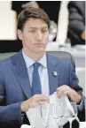  ??  ?? Preocupado.
El primer ministro de Canadá, Justin Trudeau, el pasado 28 de junio durante una cumbre del G20, en Osaka, Japón.