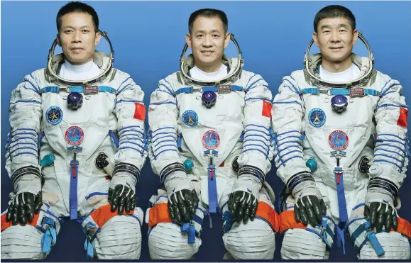  ?? Photo: China Manned Space Agency ?? Shenzhou-12’s crew (from left); Tang Hongbo, Nie Haisheng and Liu Boming.