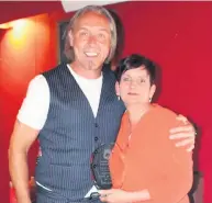  ??  ?? Fans choice Lang Online Supporters’ Player of the Year was presented by Caroline Logan and assistant coach Billy Campbell collected it on John Gemmell’s behalf