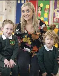  ??  ?? Ms Keane with Lily O’Brien and Mitchell Dunwoody Byrne in one of the new bright junior infant classrooms.