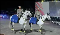  ??  ?? Officers who took part in the 60th anniversar­y celebratio­n of Abu Dhabi Police appeared in their new uniforms.