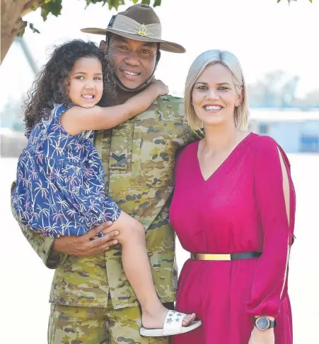  ?? Picture: MATT TAYLOR ?? TOUGH FAREWELL: Corporal Apaitia Matalau, Amali, 4, and Tia Matalau at yesterday’s farewell parade at Lavarack Barracks for soldiers deploying to the Middle East.