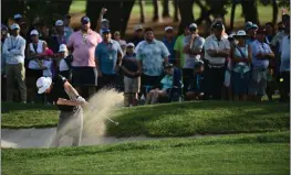  ?? JULIO AGUILAR — GETTY IMAGES ?? Peter Malnati of the United States plays a shot from a bunker on the 18th hole during the final round of the Valspar Championsh­ip at Copperhead Course at Innisbrook Resort and Golf Club on Sunday in Palm Harbor, Fla.