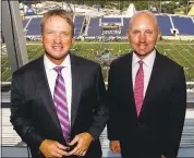  ?? GENE PUSKAR - ASSOCIATED PRESS ARCHIVES ?? Jon Gruden, left, is leaving his ESPN job broadcasti­ng games with play-by-play man Sean McDonough to return as head coach of the Raiders.