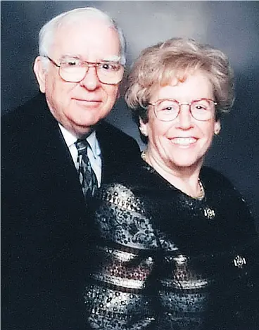  ?? POSTMEDIA NEWS FILES ?? Retired tax court judge Alban Garon and his wife Raymonde Garon are seen in this photo carried into their funeral in Ottawa in 2007.