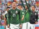  ?? YURI CORTEZ/AFP/GETTY IMAGES ?? Edson Alvarez (27) and his Mexico teammates celebrate their upset of Germany.