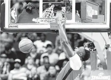  ?? Elizabeth Conley / Staff photograph­er ?? Clint Capela scored 19 points with a season-high 16 rebounds and six blocks against the Warriors.