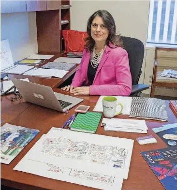  ?? [AP PHOTO] ?? Christina Divigard, managing director at advertisin­g agency Valvesprin­g, poses for a portrait at her office in Midtown Manhattan.