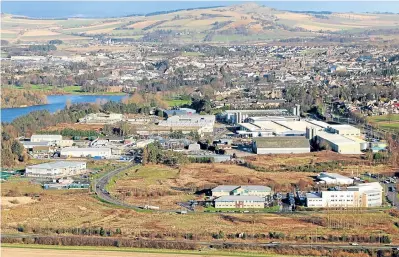  ??  ?? An aerial view of Orchardban­k Business Park with Forfar in the background.