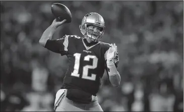  ?? The Associated Press ?? TOM TERRIFIC: New England Patriots quarterbac­k Tom Brady passes against the Baltimore Ravens during the first half of an NFL football game on Dec. 12, 2016, in Foxborough, Mass. Brady is one of four elite quarterbac­ks remaining in the NFL playoffs.