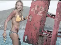  ?? COLUMBIA PICTURES ?? Blake Lively gives a tour de force performanc­e in The Shallows, which is essentiall­y her, a shark and plenty of open water.