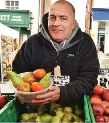  ??  ?? Roaring trade: Wayne Bellows at his stall in Lymington