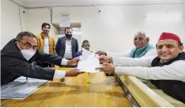  ?? — PTI ?? Samajwadi Party president Akhilesh Yadav files his nomination for the Uttar Pradesh Assembly elections in Mainpuri.