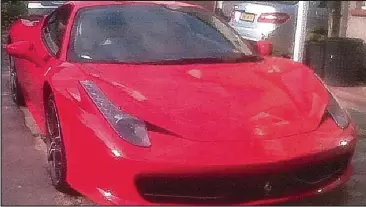  ??  ?? Red flag: The £178,000 Ferrari that Iqbal drove to work, raising his fellow officers’ suspicions