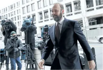  ?? MARK WILSON/ GETTY IMAGES ?? Rick Gates arrives at the Prettyman Federal Courthouse for a hearing Friday in Washington, D. C. Gates, a former aide to U. S. President Donald Trump, pleaded guilty to conspiracy and false- statement charges.