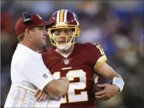  ?? ASSOCIATED PRESS FILE ?? Redskins backup and former Browns quarterbac­k Colt McCoy could fit in as a bridge until a newly drafted passer is ready.