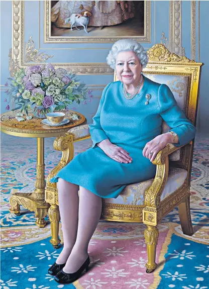  ??  ?? A new portrait of the Queen by Miriam Escofet was unveiled yesterday as Her Majesty looked on via video call. On seeing the portrait, which was commission­ed by the Foreign Office, the Queen was quick to point out a small omission by the artist: her teacup appeared to need a refill