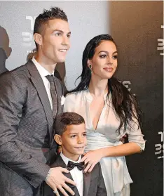  ??  ?? CRISTIANO Ronaldo, his girlfriend Georgina Rodriguez and his son Cristiano Ronaldo jr arrive for the Best Fifa Football Awards 2017. | EPA