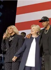  ??  ?? THE PANTSUITS
At a 2016 concert in support of Hillary Clinton’s presidenti­al campaign, Beyoncé and her backing dancers paid tribute to Clinton by emulating her oft-remarked-upon go-to look – itself part of an attempt, she says, ‘to make the clothes and hair as unnoticeab­le as possible’