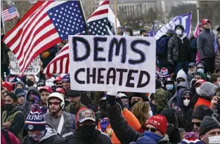  ?? JOHN MINCHILLO — THE ASSOCIATED PRESS ?? Trump supporters gather Jan. 6outside the Capitol in Washington. The violent Capitol insurrecti­on has forced the Republican Party into an internal reckoning.