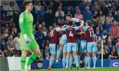  ??  ?? Kepa Arrizabala­ga looks crestfalle­n as Burnley celebrate their first-half equaliser. Photograph: Mark Greenwood/IPS/REX/Shuttersto­ck