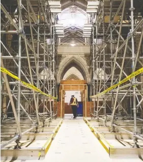  ?? JUSTIN TANG / THE CANADIAN PRESS ?? Scaffoldin­g lines the Hall of Honour, seen during a media tour this week of Centre
Block renovation­s, which will also bring the building up to date technologi­cally.