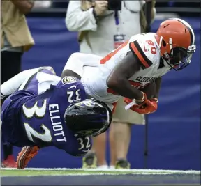  ?? GAIL BURTON - THE ASSOCIATED PRESS ?? Cleveland Browns wide receiver Jarvis Landry (80) is tackled just shy of the goal line by Baltimore Ravens defensive back DeShon Elliott (32) during the third quarter of an NFL football game Sunday, Sept. 29, 2019, in Baltimore.
