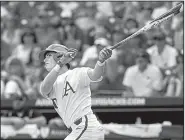  ?? NWA Democrat-Gazette/BEN GOFF ?? Arkansas’ Carson Shaddy hits a home run in the sixth inning Friday. The Razorbacks hit four home runs in the game, giving them 88 for the season, which is four shy of the school record.