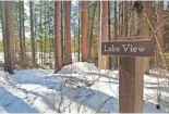  ?? CHELSEY LEWIS/MILWAUKEE JOURNAL SENTINEL ?? Skiers can take in views of Helen Lake along the McNaughton Lake trails in the Northern Highland American Legion State Forest.