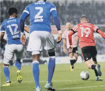  ??  ?? Aiden McGeady, back in the Sunderland side at Ipswich on Tuesday, sets up his goal in the 5-2 loss. Pic: Frank Reid