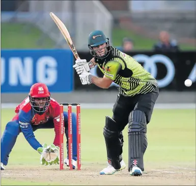  ?? Picture: GALLO IMAGES ?? FULL POWER: Mangaliso Mosehle of Bizhub Highveld Lions and Warriors captain Jon-Jon Smuts in their Momentum One Day Cup clash at St Georges Park in Port Elizabeth last night. Rain stopped play and Warriors were declared winners by Duckworth-Lewis