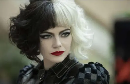  ?? Laurie Sparham/Disney ?? Emma Stone stars in "Cruella" in theaters and on Disney+.