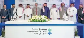  ?? ?? The MoU to create New Murabba — the world’s largest, modern downtown — was signed by NMDC CEO Michael Dyke and TDF CEO Qusai bin Abdullah Al-Fakhri.