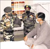  ??  ?? ■ (From left) Army chief General Manoj Mukund Naravane interacts with a soldier who is recovering at the Military Hospital in Leh. Indian soldiers at the foothills of a mountain in Leh. A trader protests against China in New Delhi’s Karol Bagh.