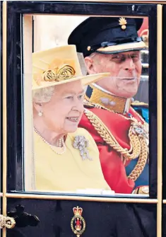  ??  ?? The Duke and the Queen on the way to Prince William and Kate Middleton’s wedding