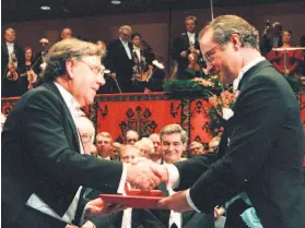  ?? Eric Roxfelt / Associated Press 1995 ?? Paul Crutzen (left) receives the Nobel Prize in chemistry from Swedish King Carl XVI Gustaf at the Concert Hall in Stockholm in December 1995.
