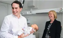  ??  ?? Newborn baby Rose with her father and the Social Protection Minister Regina Doherty in Holles Street Hospital.