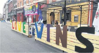  ?? ANDREW WATERMAN/THE TELEGRAM ?? Outside The Grapevine on Water Street, where the St. John’s Pride board of directors held their meet and greet on Sunday.