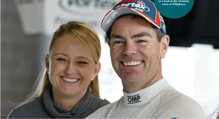  ?? PHOTO: CONTRIBUTE­D ?? Craig Lowndes with wife Lara Lowndes during the Bathurst 1000, at the Mount Panorama Circuit, last year.