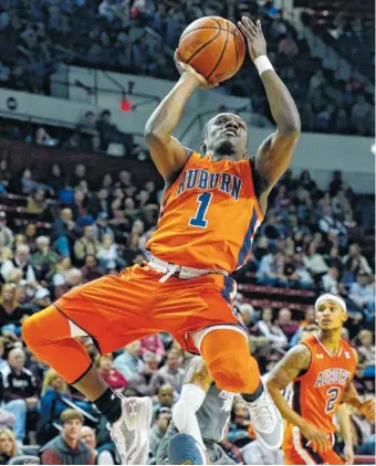  ?? THE ASSOCIATED PRESS ?? Auburn guard Jared Harper shoots an unconteste­d layup during the second half against Mississipp­i State on Saturday in Starkville, Miss. Auburn won 76-68.