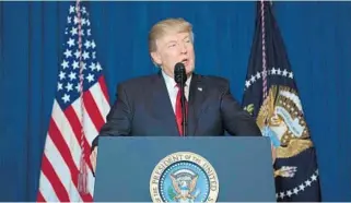  ?? JIM WATSON/AFP ?? U.S. President Donald Trump delivers a statement on Syria from Mar-a-Lago. Trump ordered a strike against Syria Thursday in retaliatio­n for a chemical weapons attack they blame on President Bashar al-Assad.