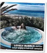  ??  ?? LOVELY BUBBLY: Junior Jolys enjoy a hot-tub session