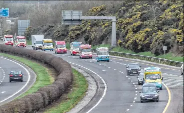  ?? (Pic: Michael Mac Sweeney/Provision) ?? The funeral cortege of Philip Williams (‘Mr Softee’), including many ice cream van colleagues pictured on its way to The Island Crematoriu­m, Ringaskidd­y on Tuesday.